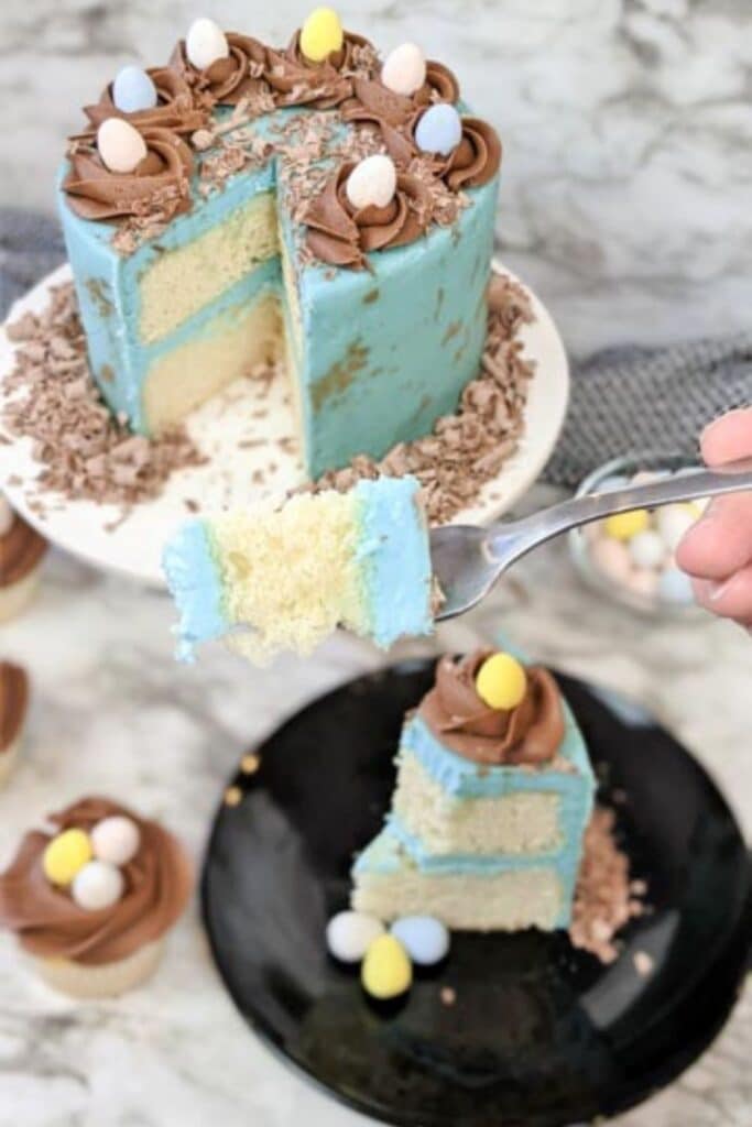 bite being taken out of a cake on fork