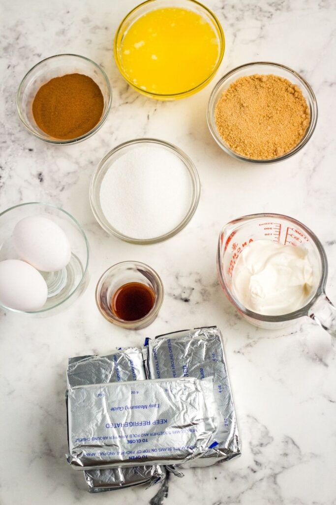 all ingredients for cheesecake on table 