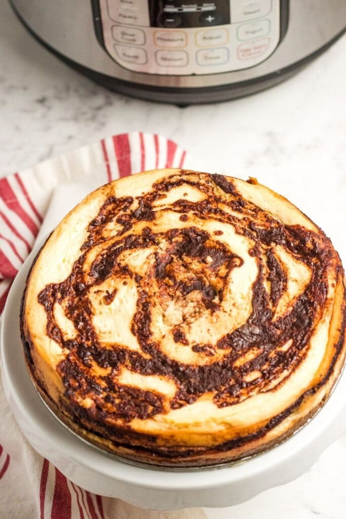 https://bakemesomesugar.com/wp-content/uploads/2021/03/homemade-cinnamon-cheesecake-683x1024.jpg