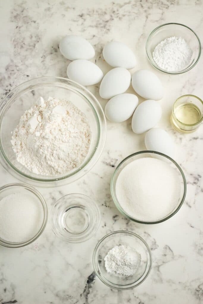 ingredients for lemon loaf on a marble counter 