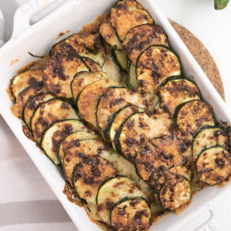 air fryer zucchini dish on white table