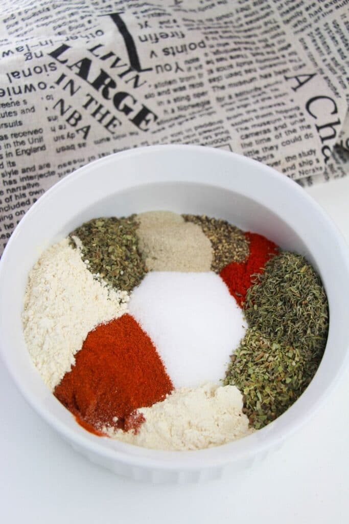 cajun seasoning spices in a white bowl 