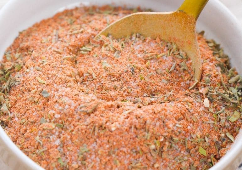 creole seasoning in bowl with spoon