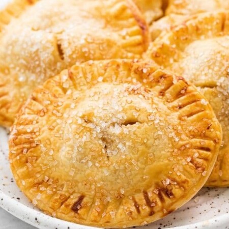 golden hand pies on a plate