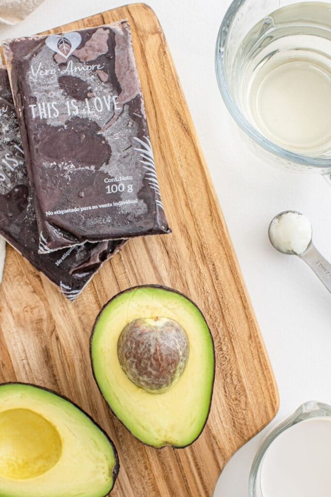 ingredients for smoothie on a cutting board and table