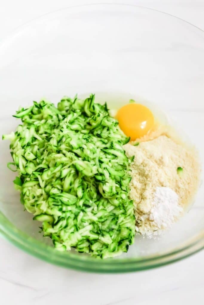 zucchini, flour, egg in bowl 