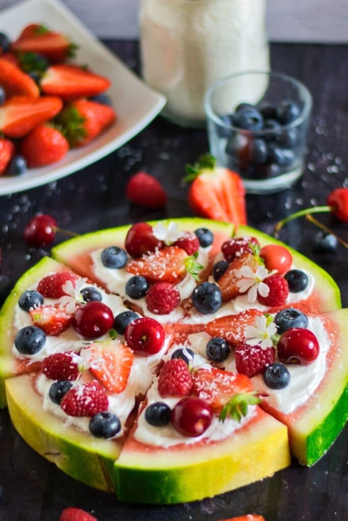 watermelon fruit dessert on black counter 