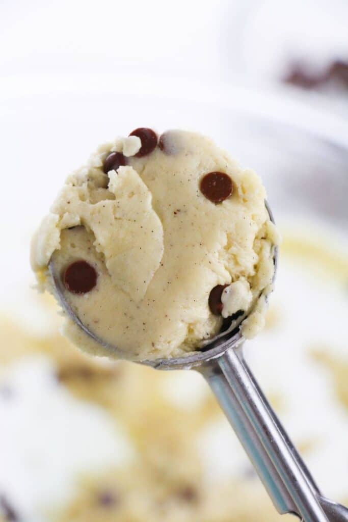 cookie scoop with cookie batter in it 