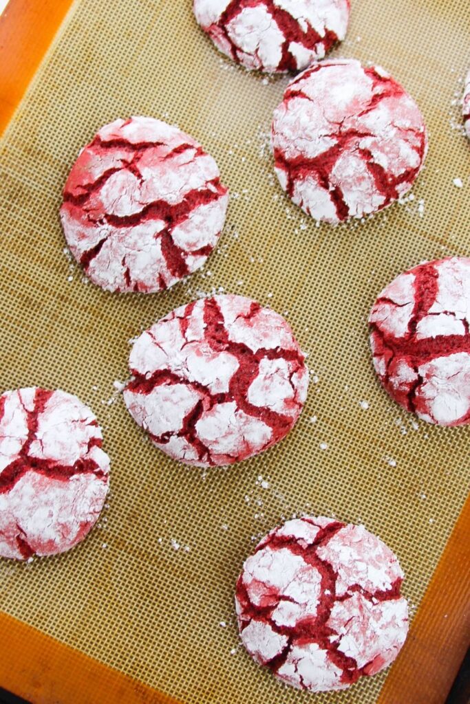 crackle cookies on a baking sheet 