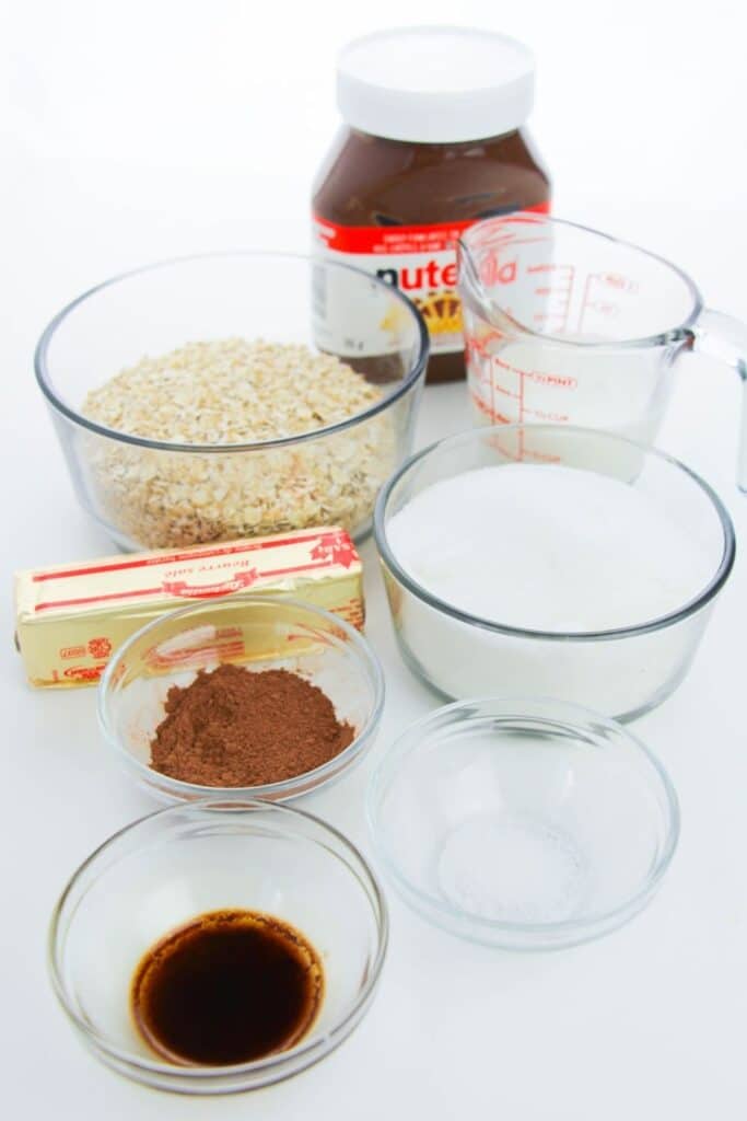 ingredients for no bake cookies all in glass bowls and containers 