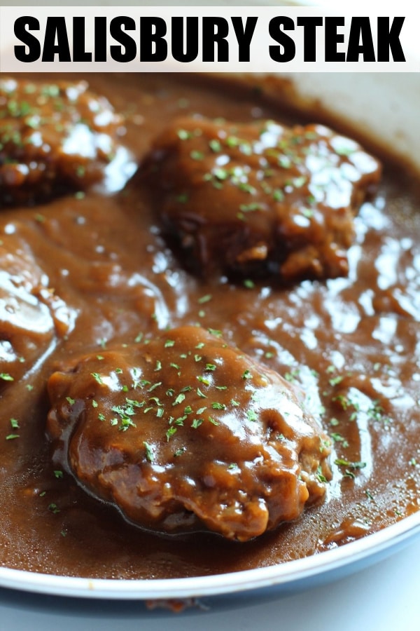 Salisbury steak in a skillet with word overlay on top 