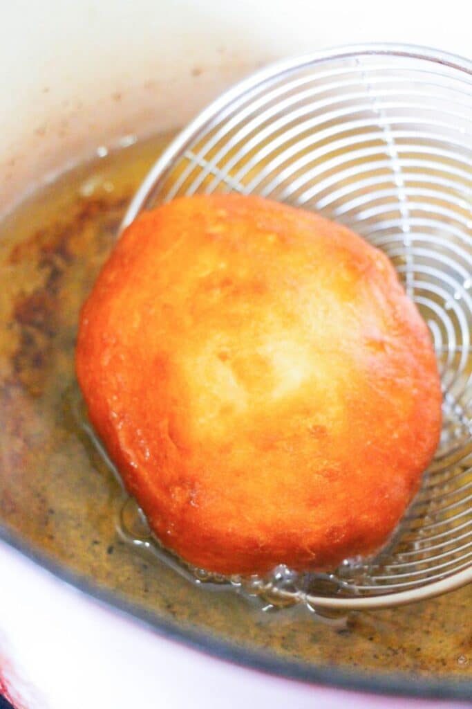 frying donut in oil