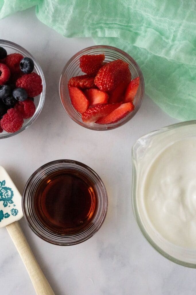 ingredients for yogurt bark on marble counter