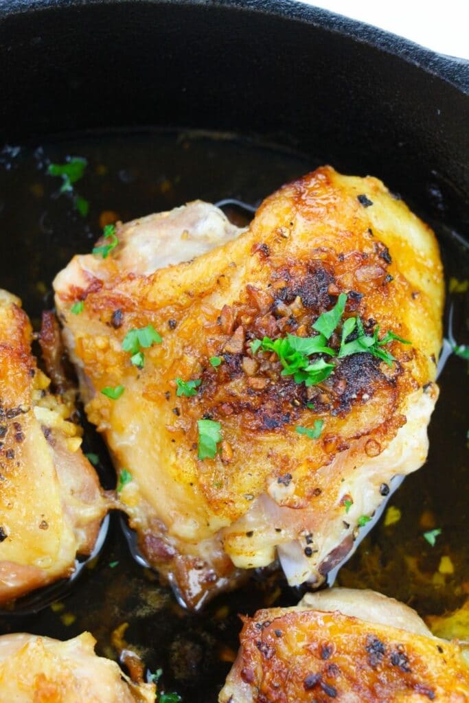 honey lime chicken in cast iron skillet