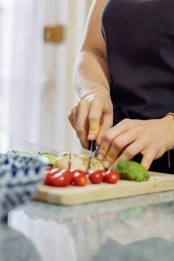 dicing up food on cutting board