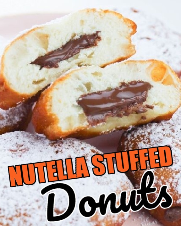 nutella filled donuts on plate one cut in half 