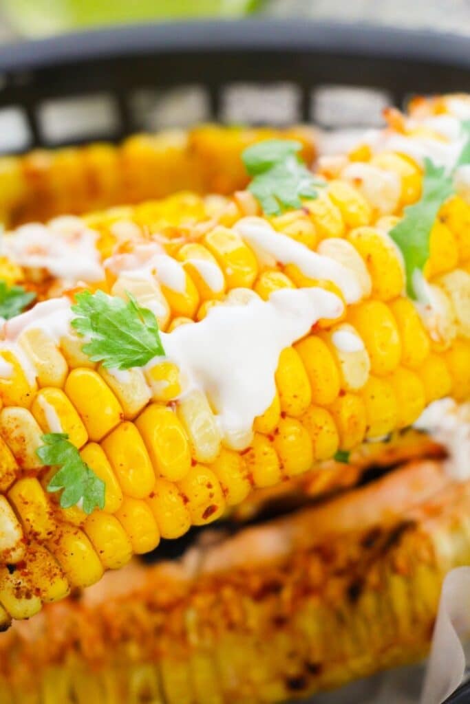 close up view of corn ribs in basket