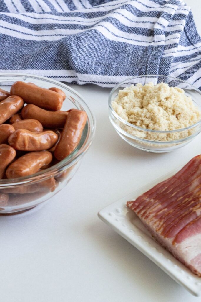 smokies, bacon and brown sugar sitting on counter in glass containers 