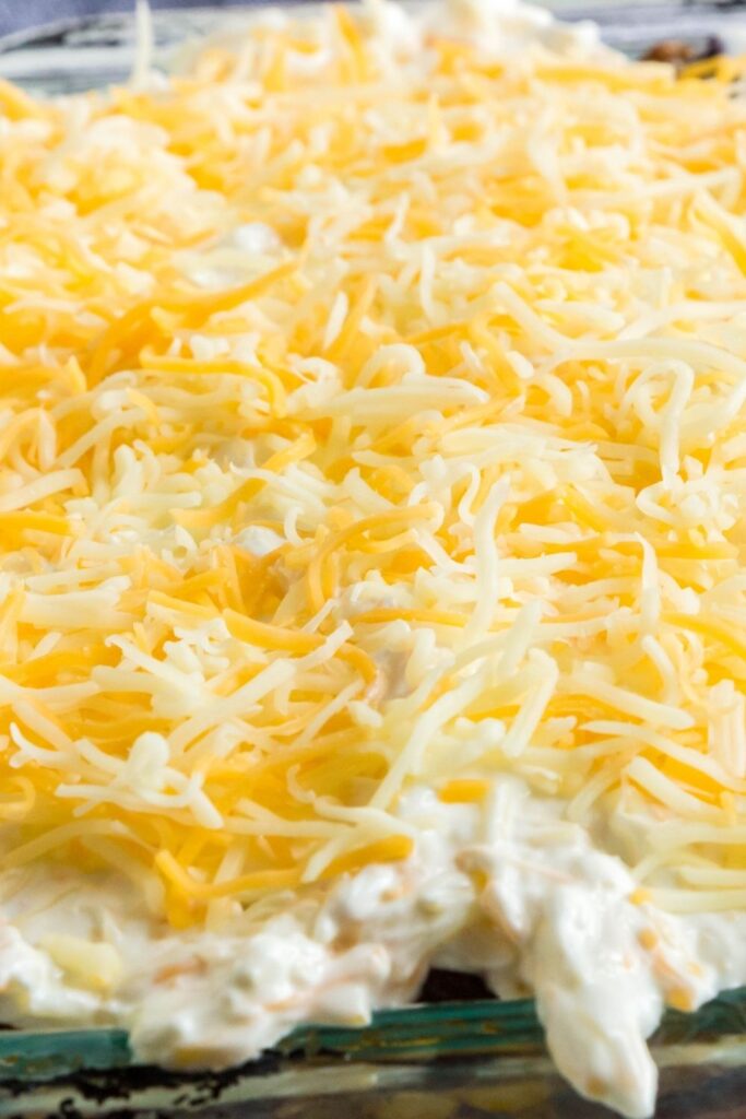 shredded cheese with sour cream topping 