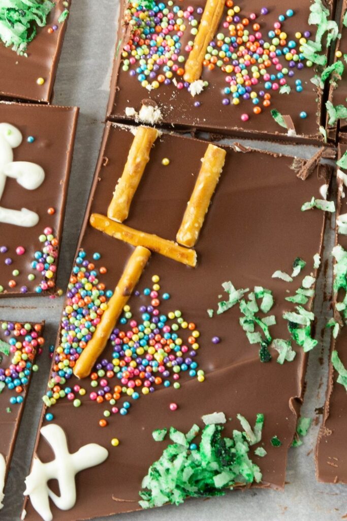 chocolate bark overhead shot with pretels, sprinkles, and coconut on it