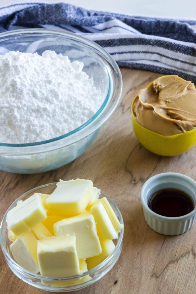 ingredients for peanut butter fudge on wooden table