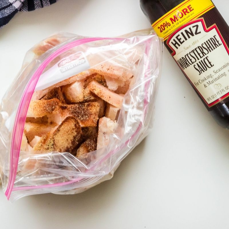 chicken in a bag with bottle of Worcestershire by it 