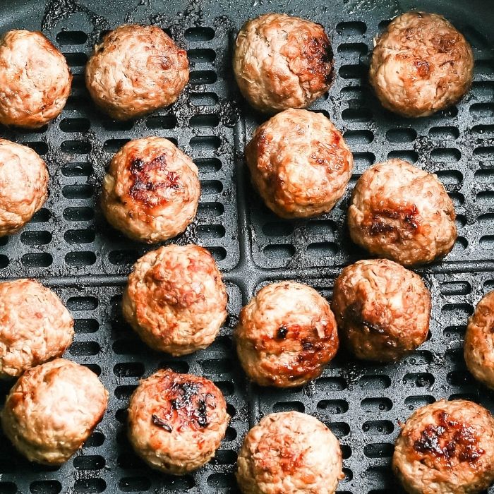 meatballs in an air fryer basket 