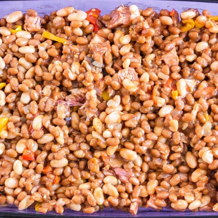 baked beans with ham in pan on counter