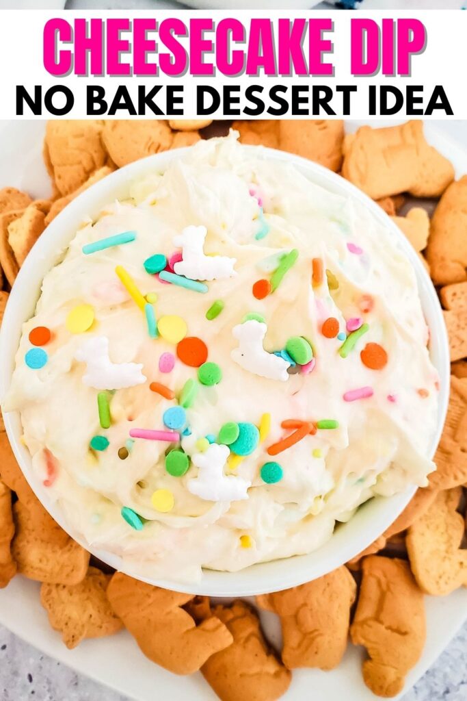 cheesecake dip in a bowl with cookies around it 