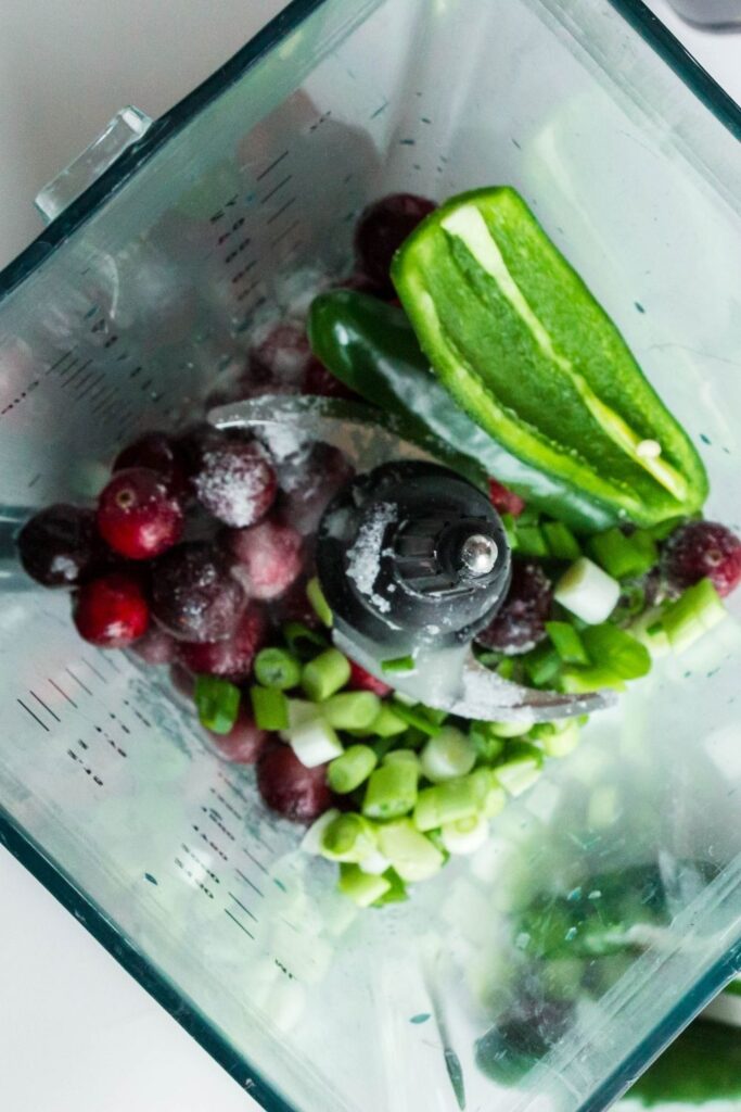 cranberry salsa ingredients in blender, overhead shot