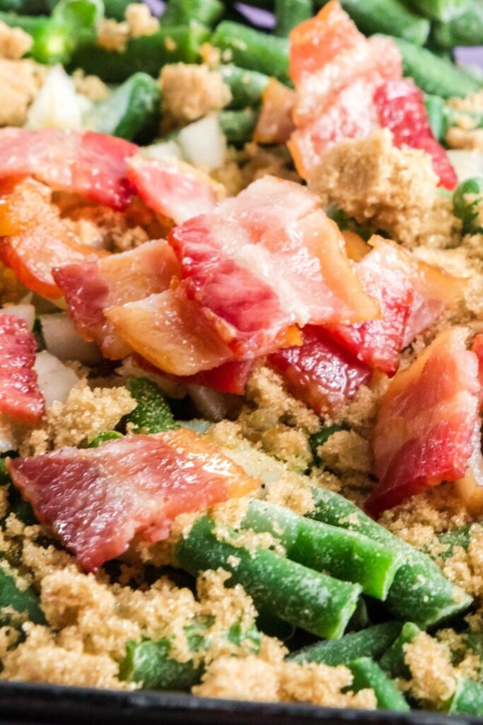 bacon, brown sugar, green beans all mixed in baking dish