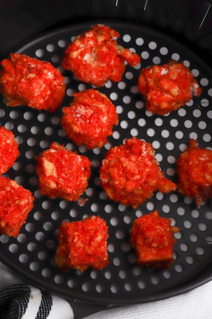 overhead shot of cheese bites in air fryer 