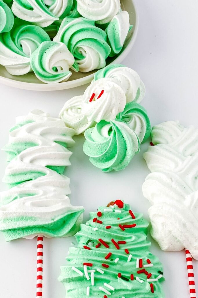 Christmas meringues on white counter 