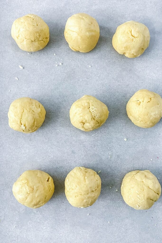 peanut butter balls on parchment paper 