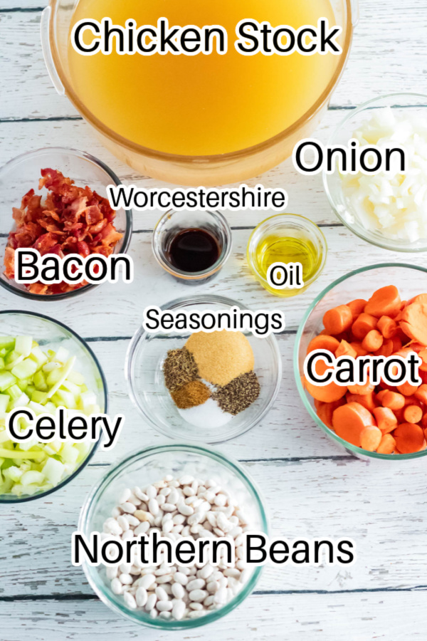 ingredients for bean and bacon soup on wooden table 