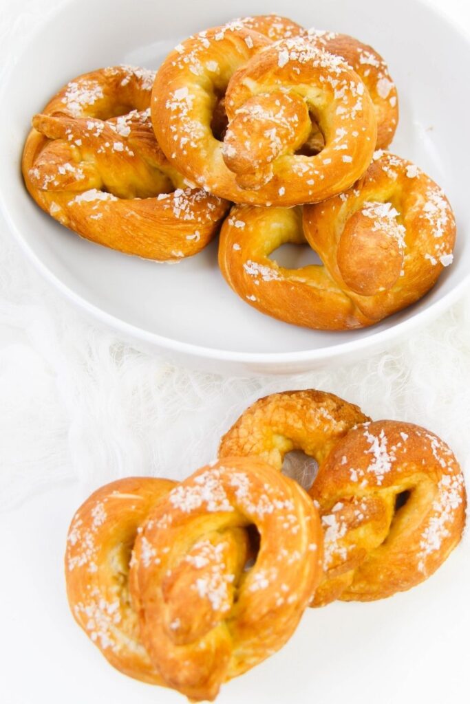 pretzels in a bowl on white table 