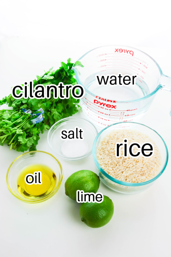 ingredients for cilantro lime rice on white table 