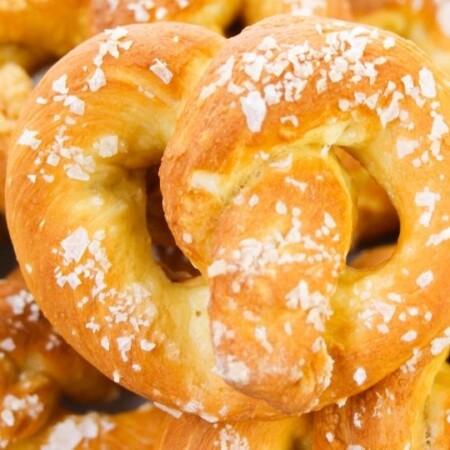 soft pretzels stacked on a plate