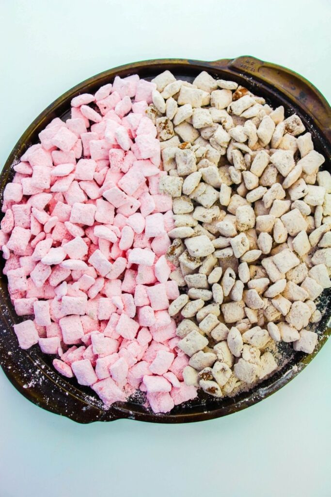 strawberry and chocolate snack mix on a platter on table