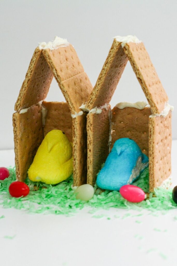 easter gingerbread houses on white table 