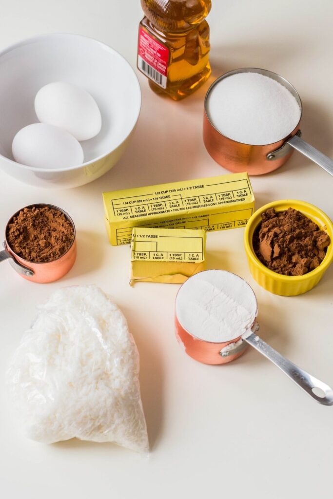 ingredients for coconut brownies on white counter