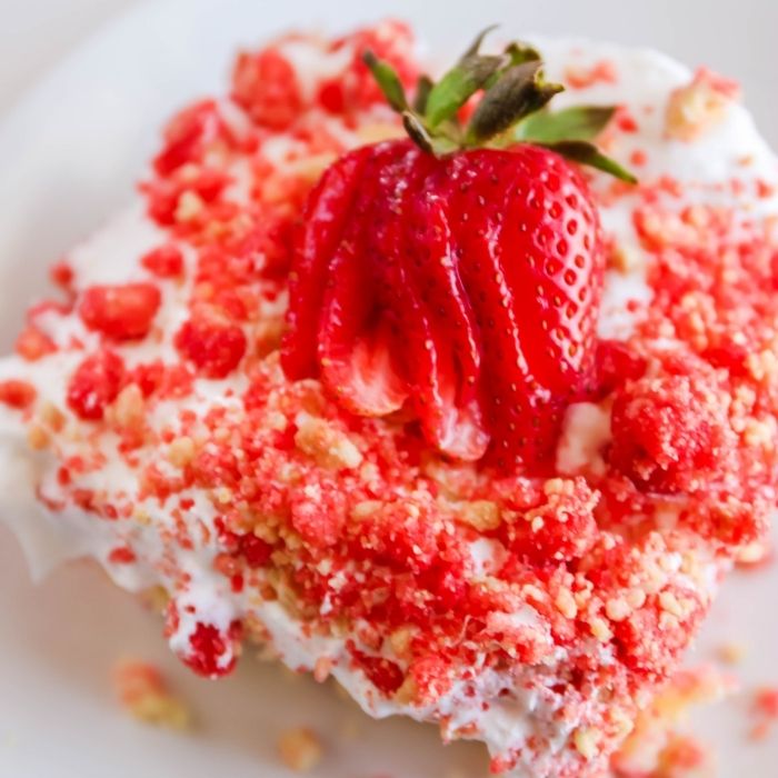 overhead shot of strawberry shortcake cake on plate 