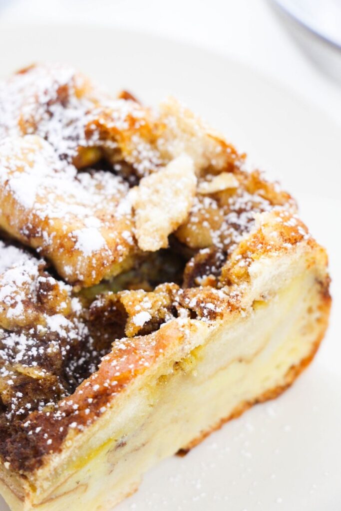 side view of overnight french toast on plate