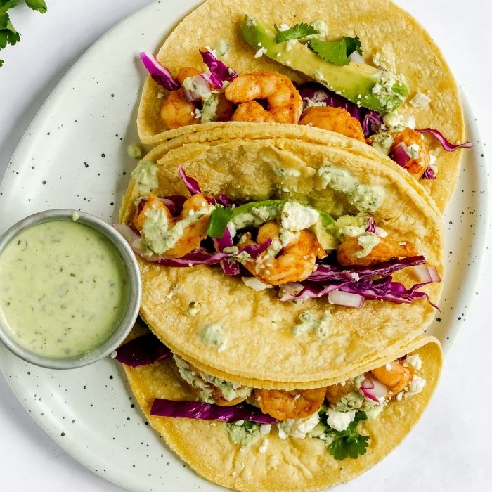 overhead shot of shrimp tacos on plate