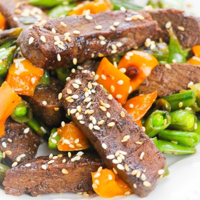 close up of beef stir fry on plate 