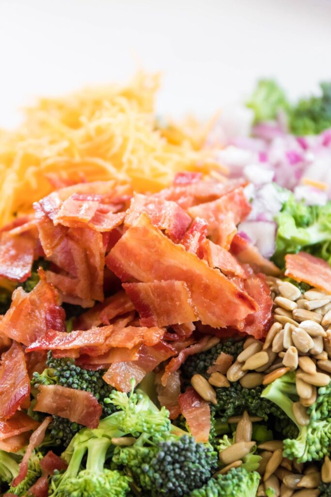 broccoli bacon salad ingredients in a bowl 