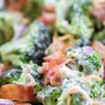 close up of broccoli salad on plate