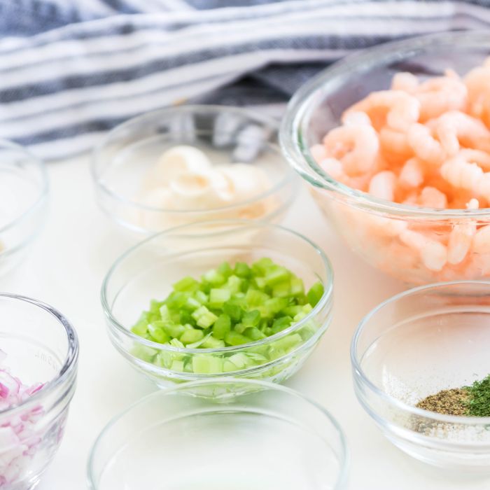 ingredients for a shrimp salad in a bowl 