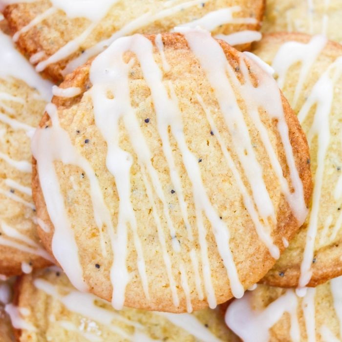 close up of lemon poppy seed cookies on plate 