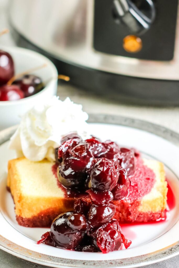 cherry jubilee on plate with pound cake